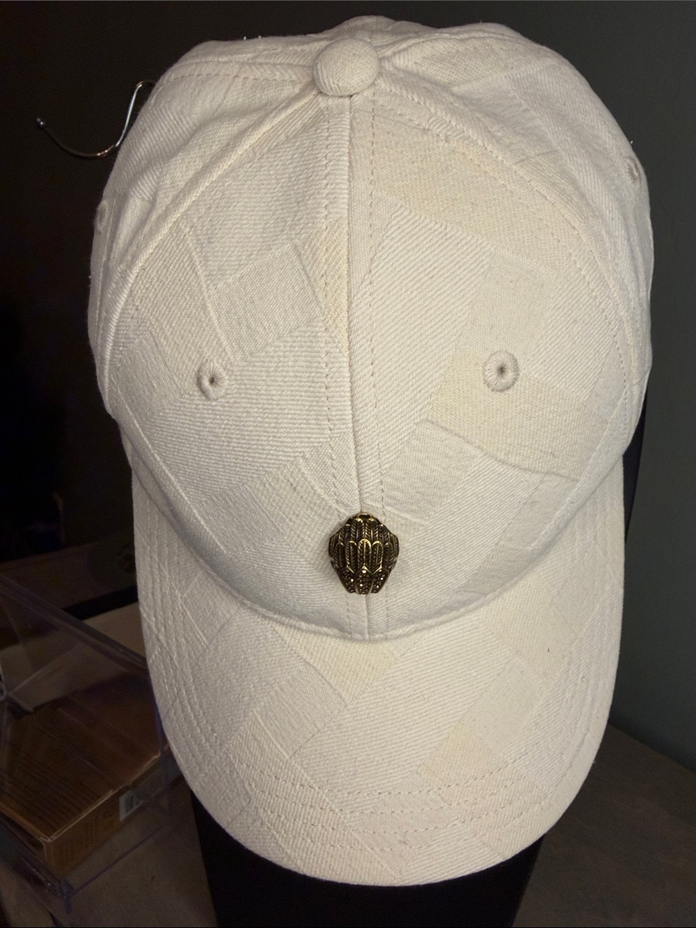 Kurt Geiger Cream Baseball Cap with Gold Crest Accent